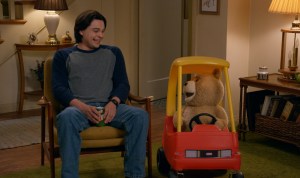 TED S2 -- Pictured: (l-r) Max Burkholder as John, Seth MacFarlane as voice of Ted -- (Photo by: Peacock)